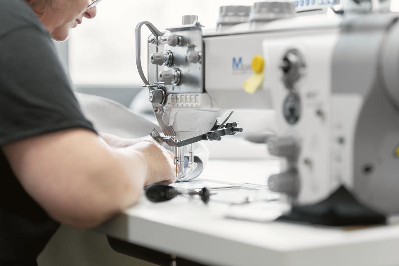 Cover being sewn on an industrial sewing machine